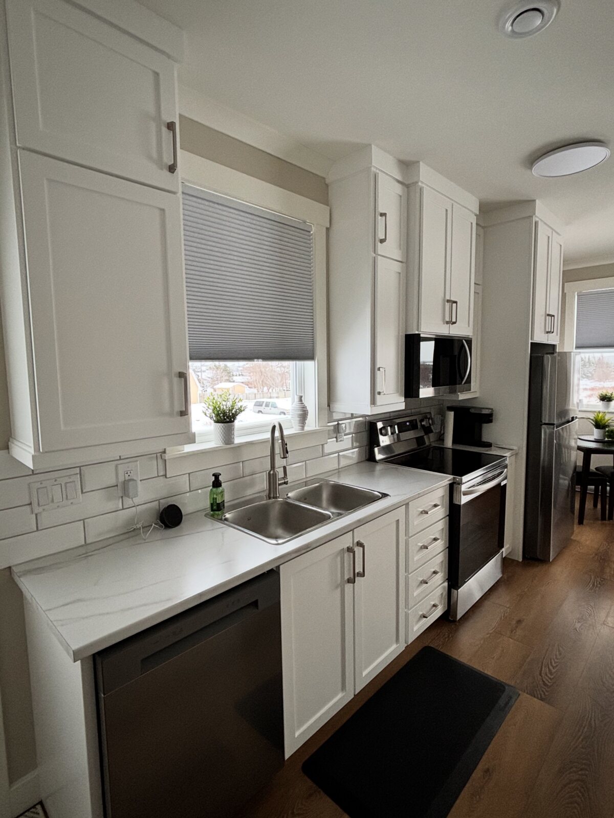 Bright, fully equipped kitchen at The Carriage House