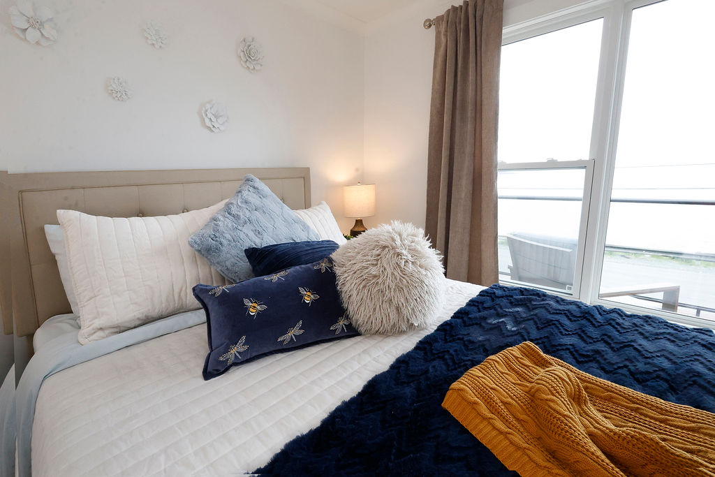 Ocean-view bedroom at The Harbour House